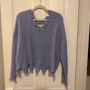 Distressed blue cropped sweater